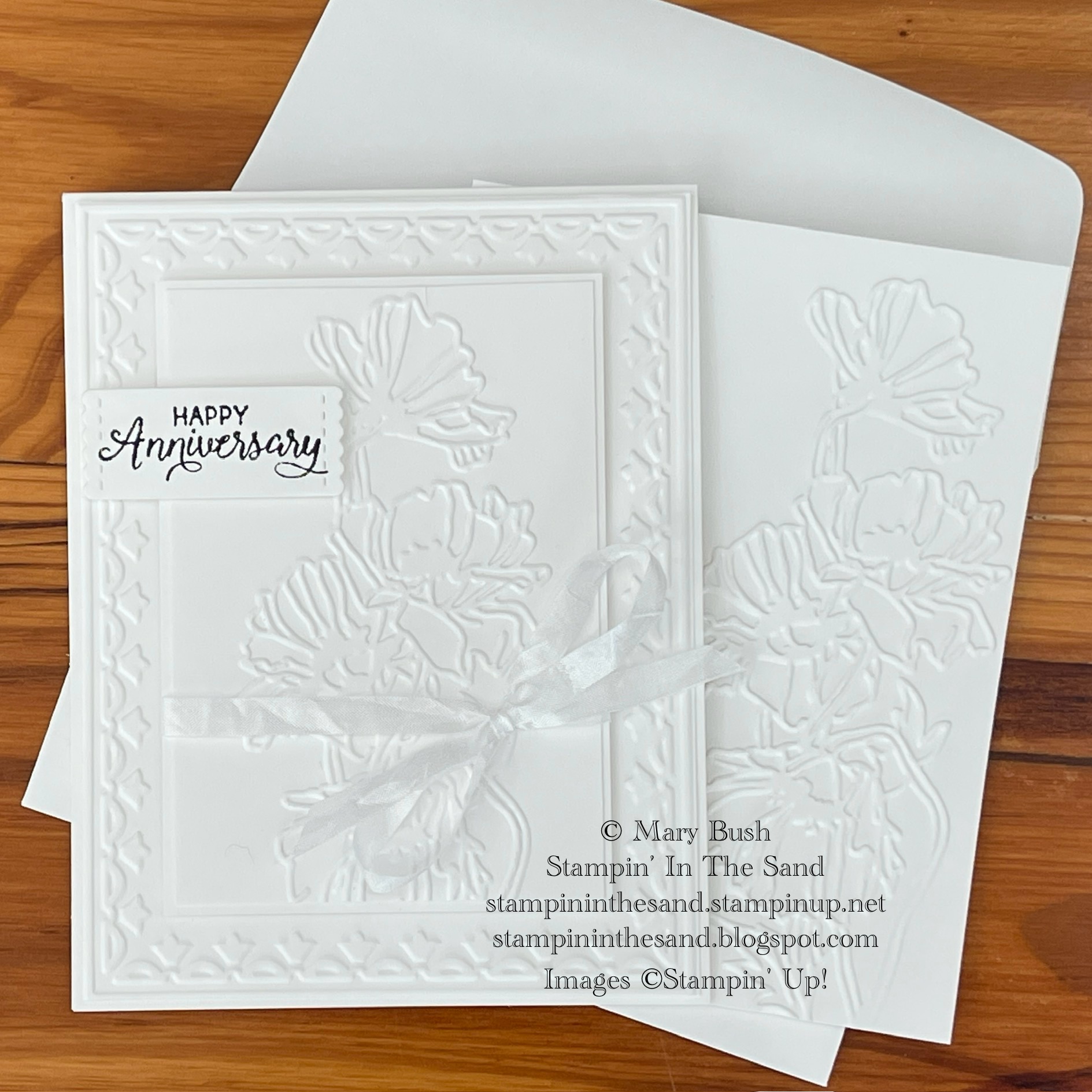 Framedtulipswithflowergardenwhiteanniversarycardmbush
