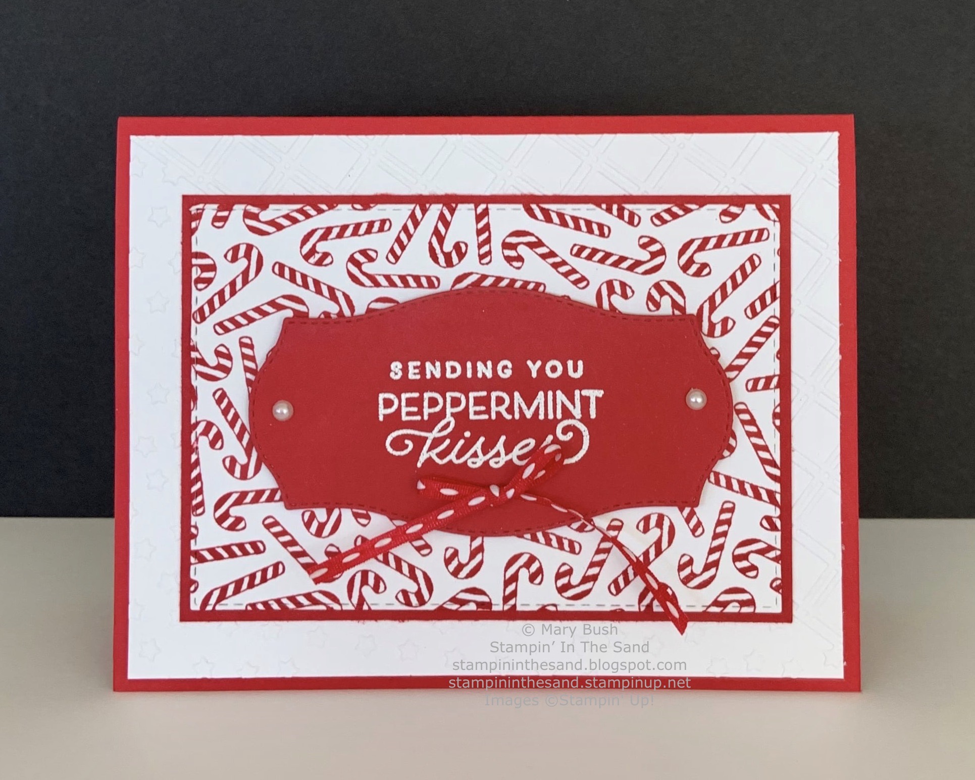 Candy cane background with gingerbread and peppermint card